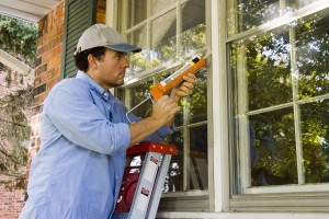 Use a caulk gun to seal your windows and doors